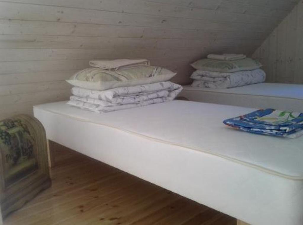 Tirbi Holiday House Kassari Szoba fotó