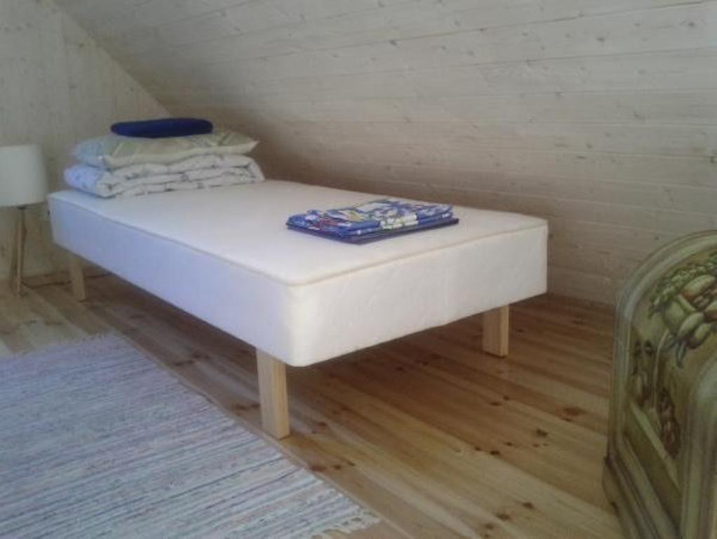 Tirbi Holiday House Kassari Szoba fotó